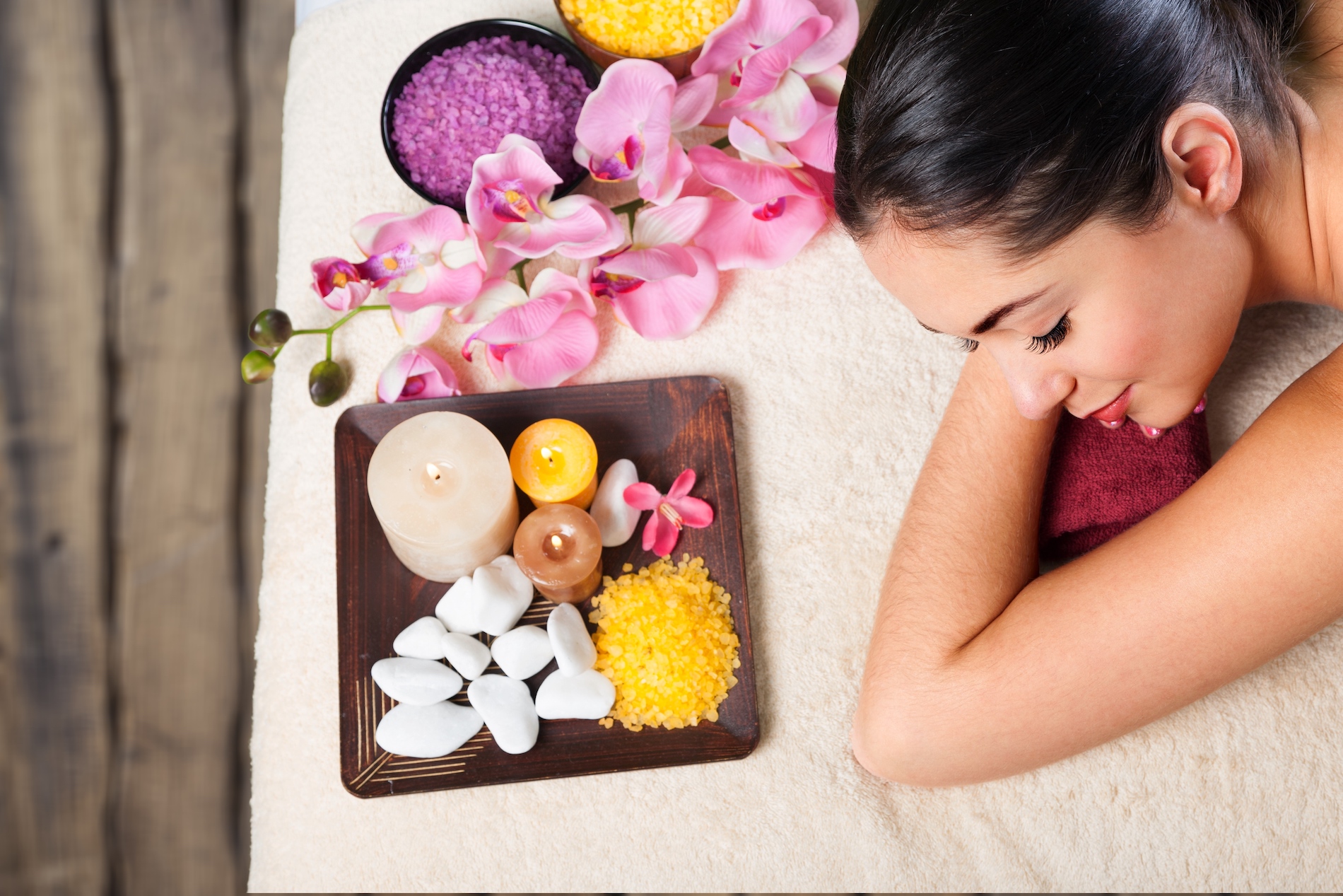 Young woman relaxing in spa salon